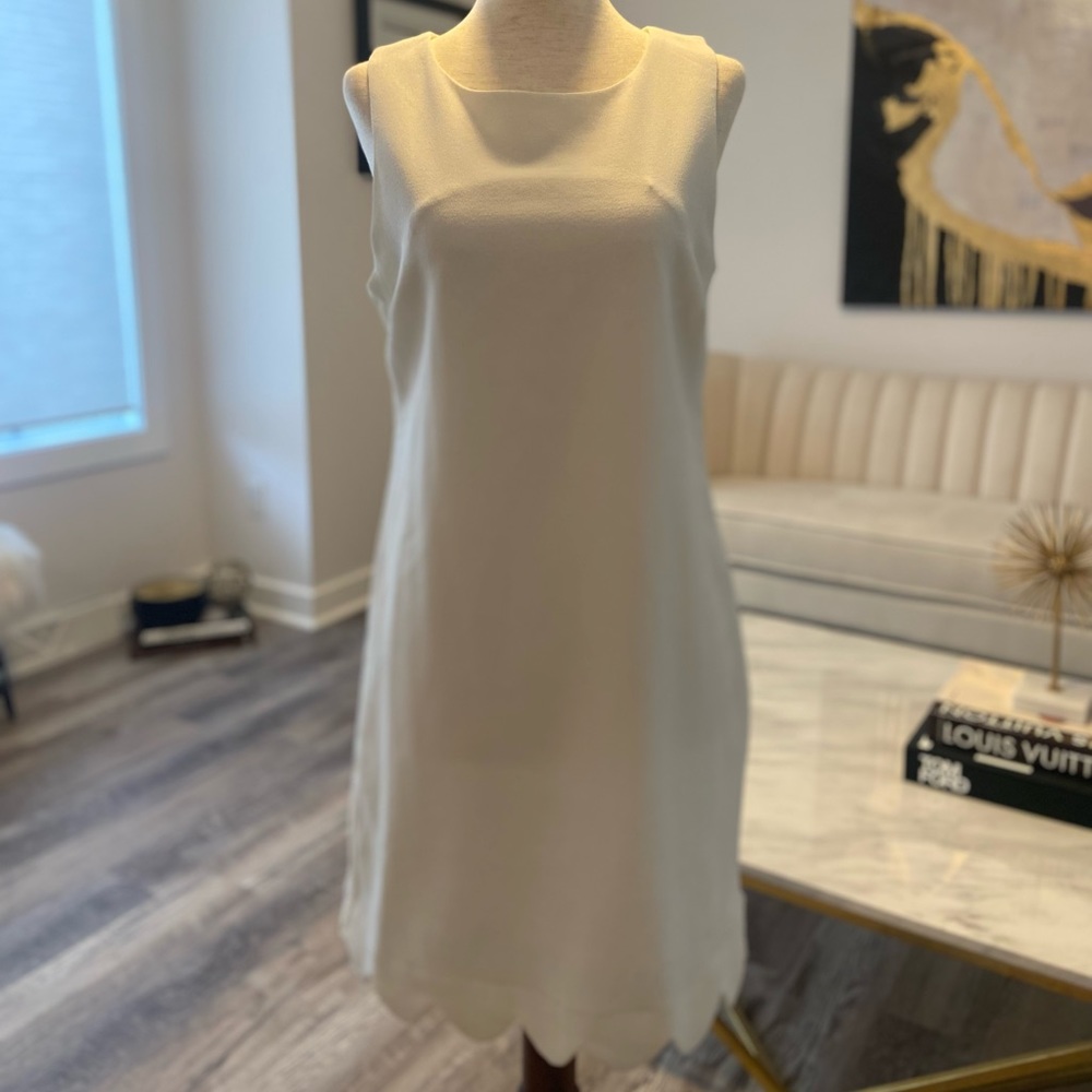 White scalloped sleeveless dress